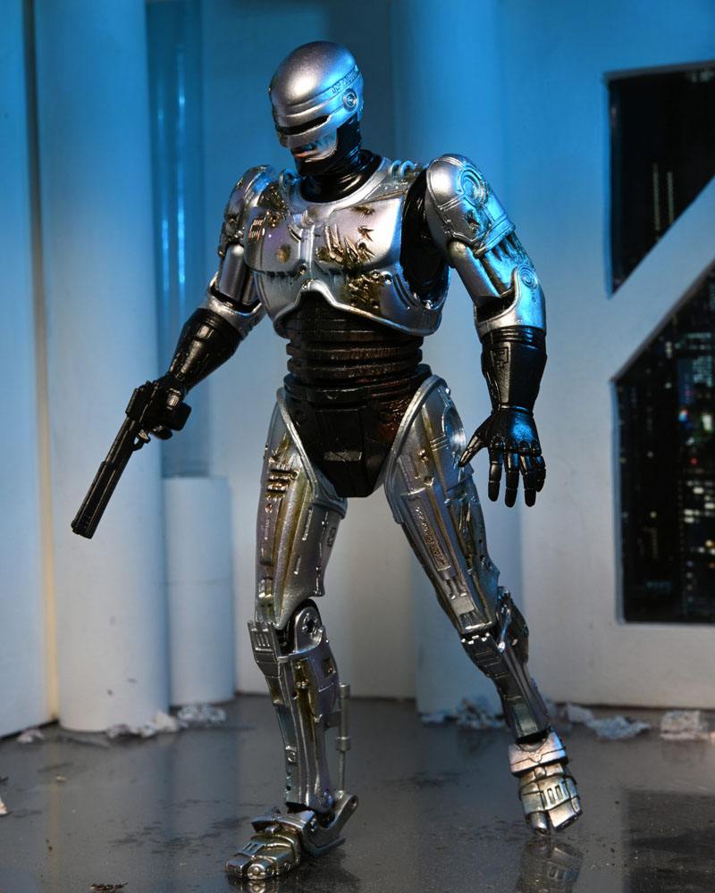 RoboCop figurine Ultimate Battle Damaged RoboCop with Chair 18 cm