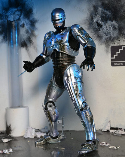 RoboCop figurine Ultimate Battle Damaged RoboCop with Chair 18 cm