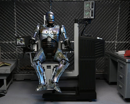 RoboCop figurine Ultimate Battle Damaged RoboCop with Chair 18 cm