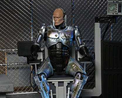 RoboCop figurine Ultimate Battle Damaged RoboCop with Chair 18 cm